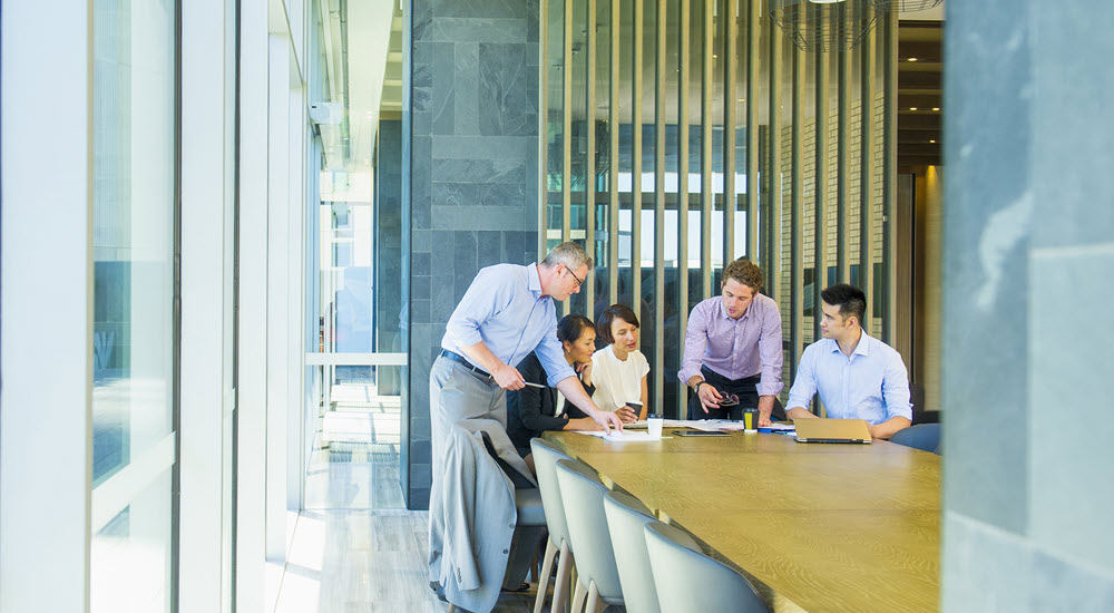Business people talking in office meeting